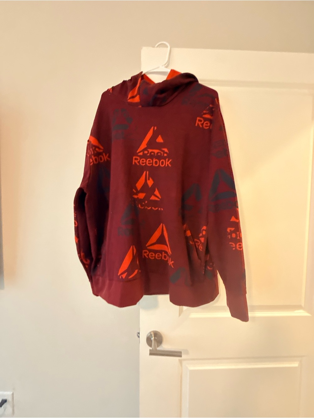 Reebok Burgundy Pullover Hoodie with Orange Logo Accents